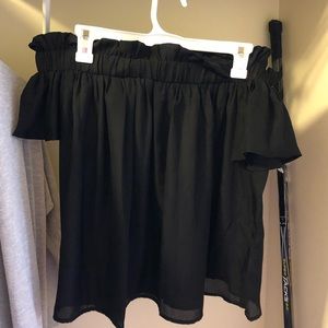 Sleeveless black sheer top